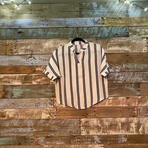 Navy blue and white striped blouse